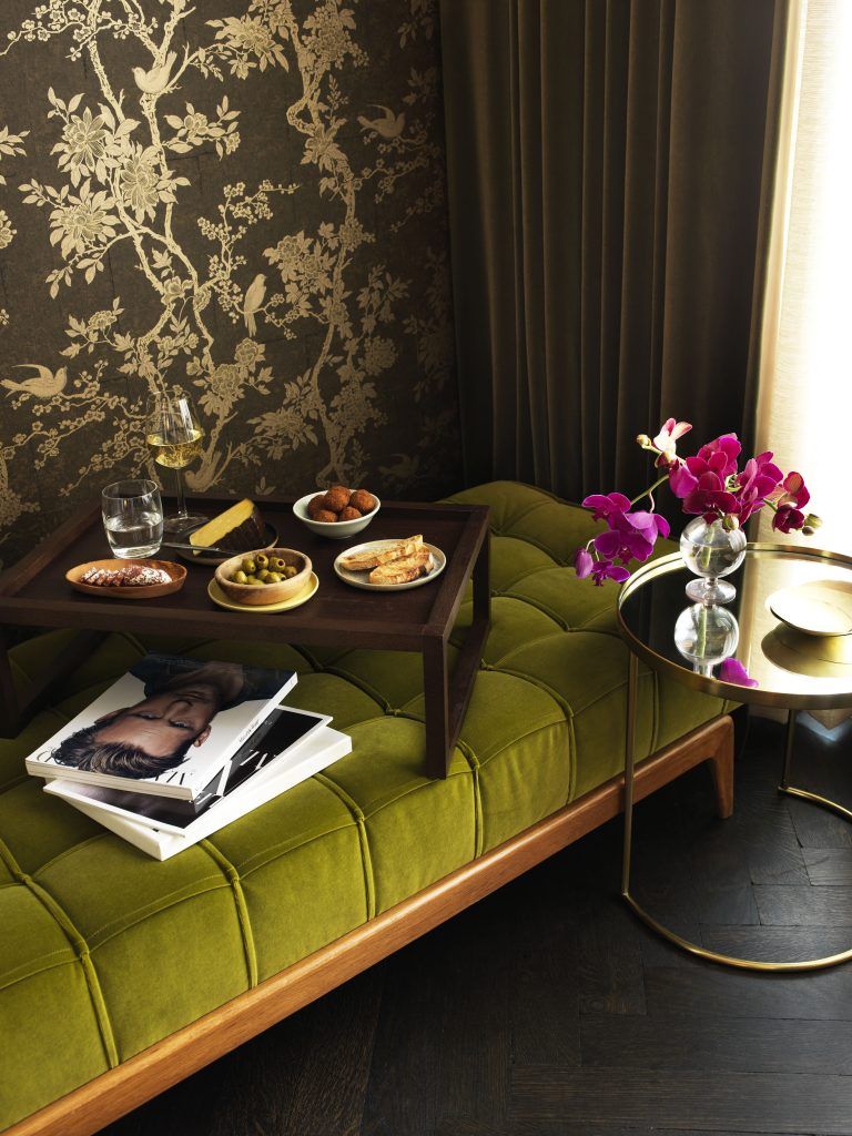 Breakfast on a green velvet bench in the Urban Suite